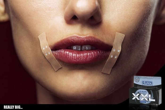 женские губы на рекламе презервативов Дюрекс, бизнес картинка