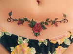 розочки внизу живота, фото женской татуировки 007