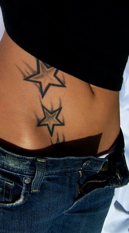 падающие звезды на животе, женская татуировка фото