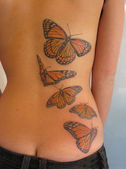летящие бабочки, женская татуировка фото